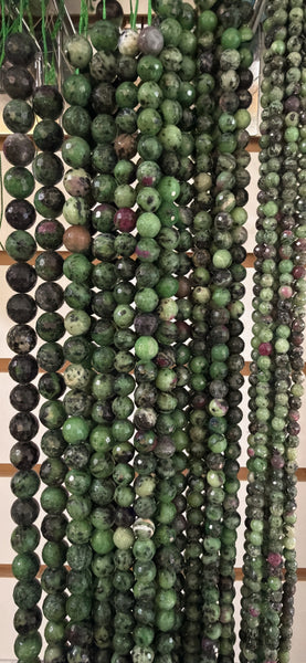 Roby Zoisite  -  128 Cut Faceted Round  16"