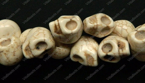 Cracked Turquoise Ivory  -  Carved Skulls 16"