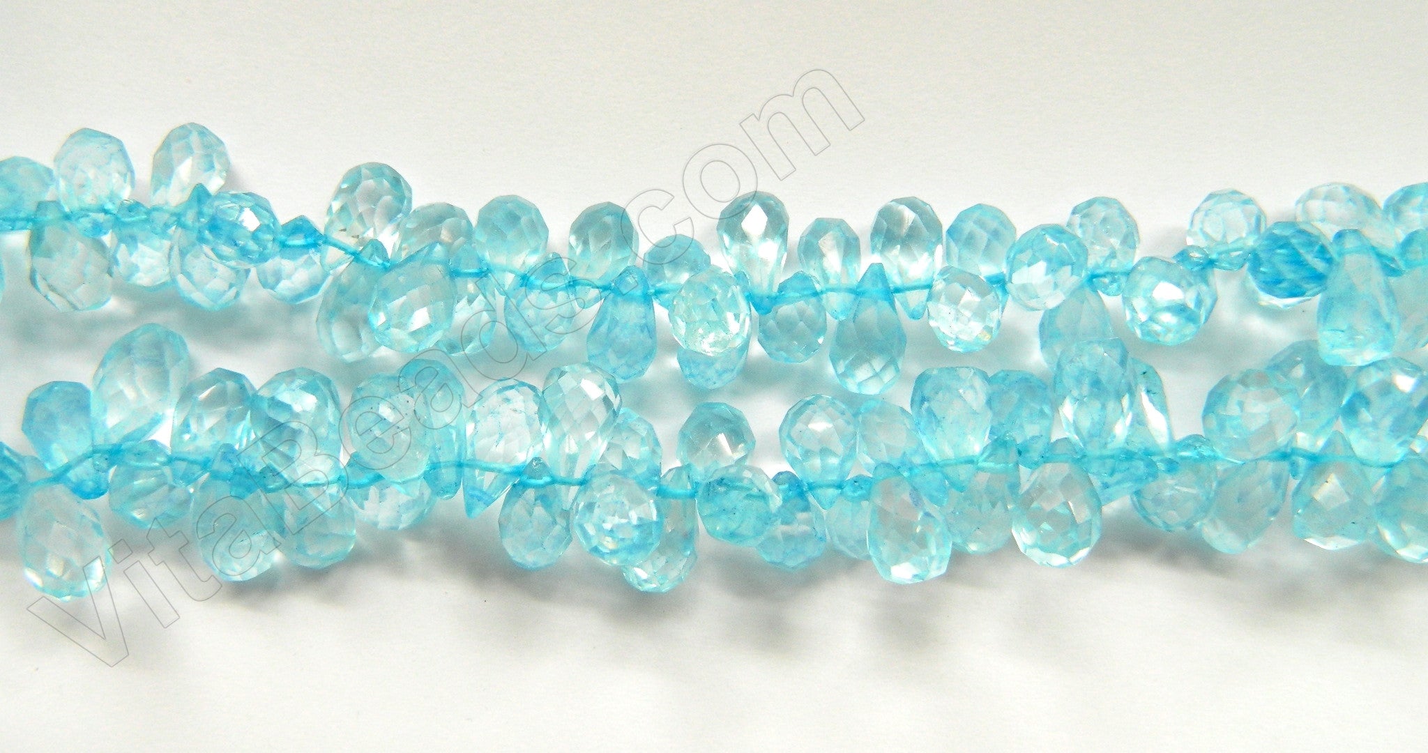 Sky Blue Topaz  -  dyed - 7-12mm Faceted Teardrop Head Drill 15"