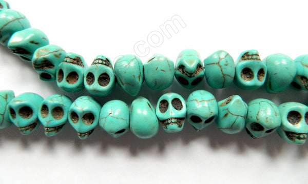 Blue Crack Turquoise  -  Carved Skulls Side-drilled  16"