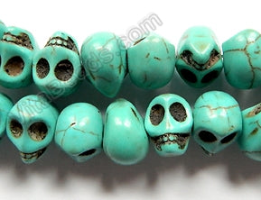 Blue Crack Turquoise  -  Carved Skulls Side-drilled  16"