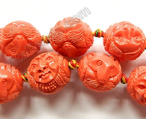 Synthetic Peach Coral  -  Carved Wolf Man Head  14"