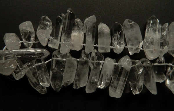 Rock Crystal Natural  -  Free Form Tooth  8"    20 - 30 mm