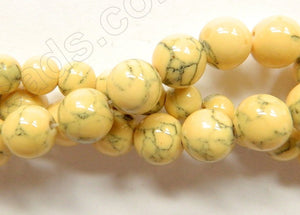 Synthetic Lemon Yellow TQ w/ Matrix  -  Smooth Round Beads  16"