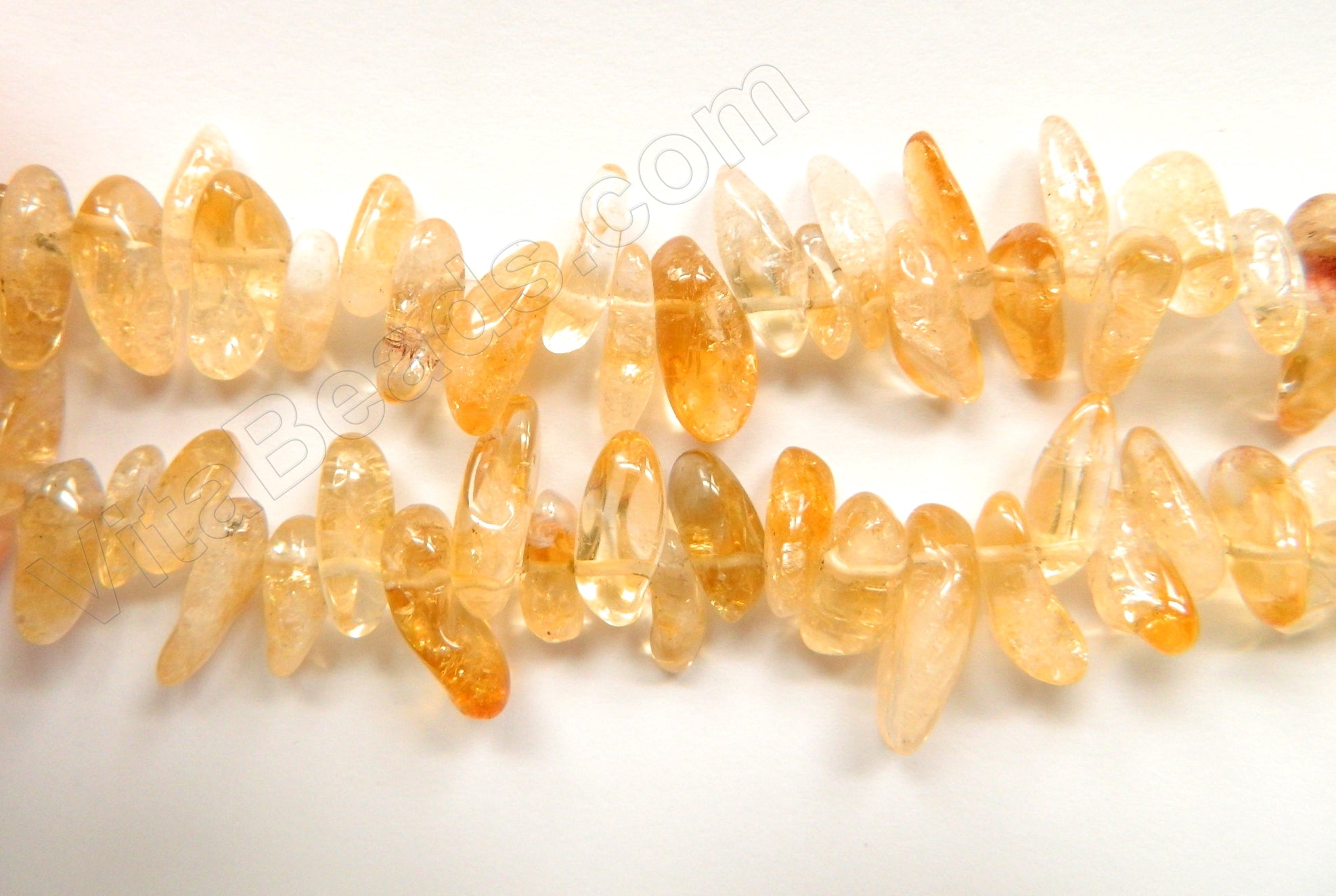 Citrine Natural AA  -  Smooth Long Tooth  16"      6 x 18 mm