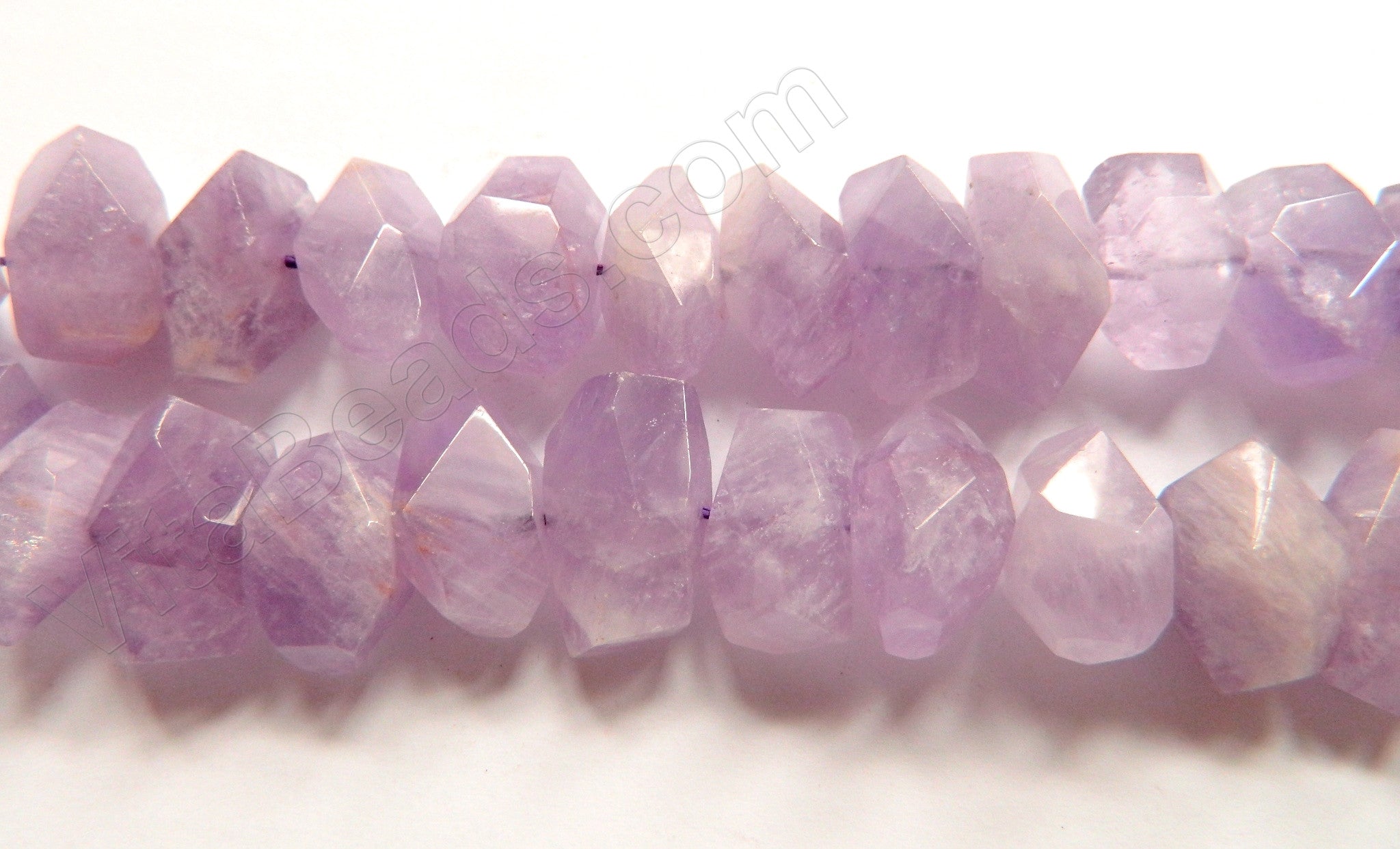 Amethyst Light AA  -  Center Cut Faceted Tumble  16"     12 - 20 mm