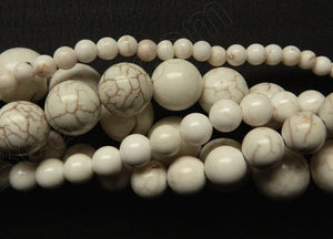 Ivory Crack Turquoise  -  Smooth Round Beads  16"