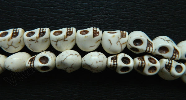 Cracked Turquoise Ivory  -  Carved Skeleton  16"