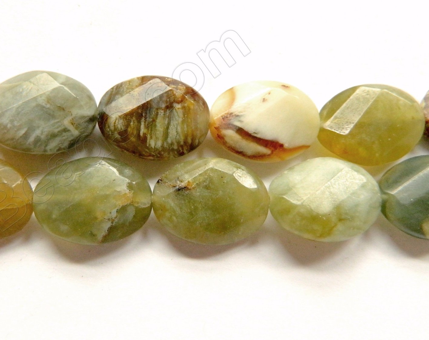 Fire New Jade  -  Twist Faceted Ovals  16"