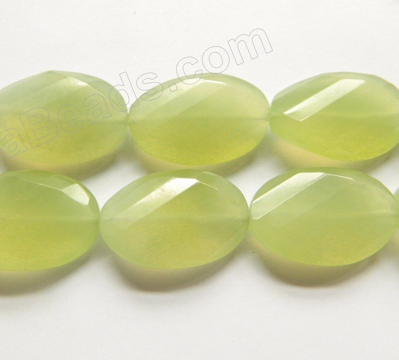 New Jade AAA  -  Twist Faceted Oval  16"