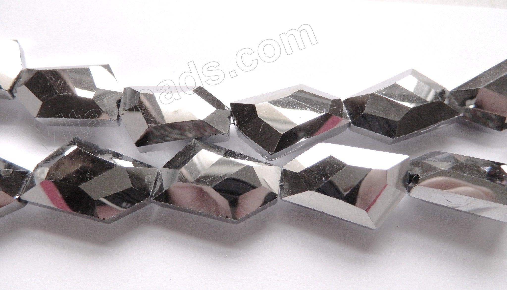 Silvery Crystal Qtz  -  Irregular Faceted Flat  11"