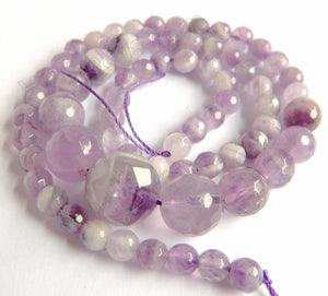 Amethyst Light  -  Graduated Faceted Round Beads 16"