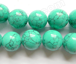 Synthetic Green Turquoise w/ Black Matrix  -  Smooth Round Beads  16"