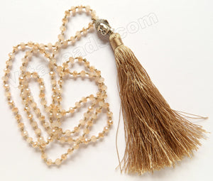 Long Chained Tassel Necklace w/ Silver Buddha Head Champ. Color