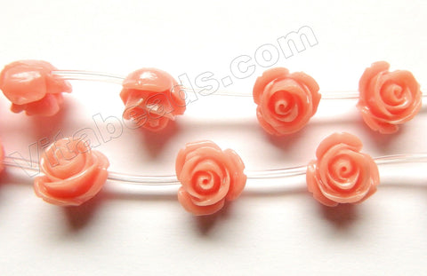Synthetic Light Peach Coral Stone  -  Carved Rose Strand  7"