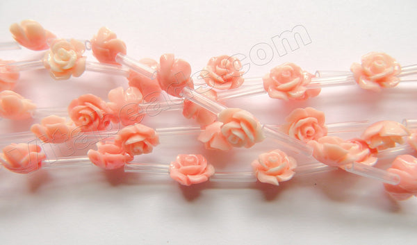 Synthetic Light Peach Coral Stone  -  Carved Rose Bulb Strand  15"