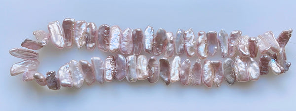 FWP  -  Light Lavender Biwa Pearls, Tooth  16"     8 x 25 mm